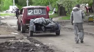 В Рубежном спасатели ЛНР начали хоронить жертв украинских боевиков